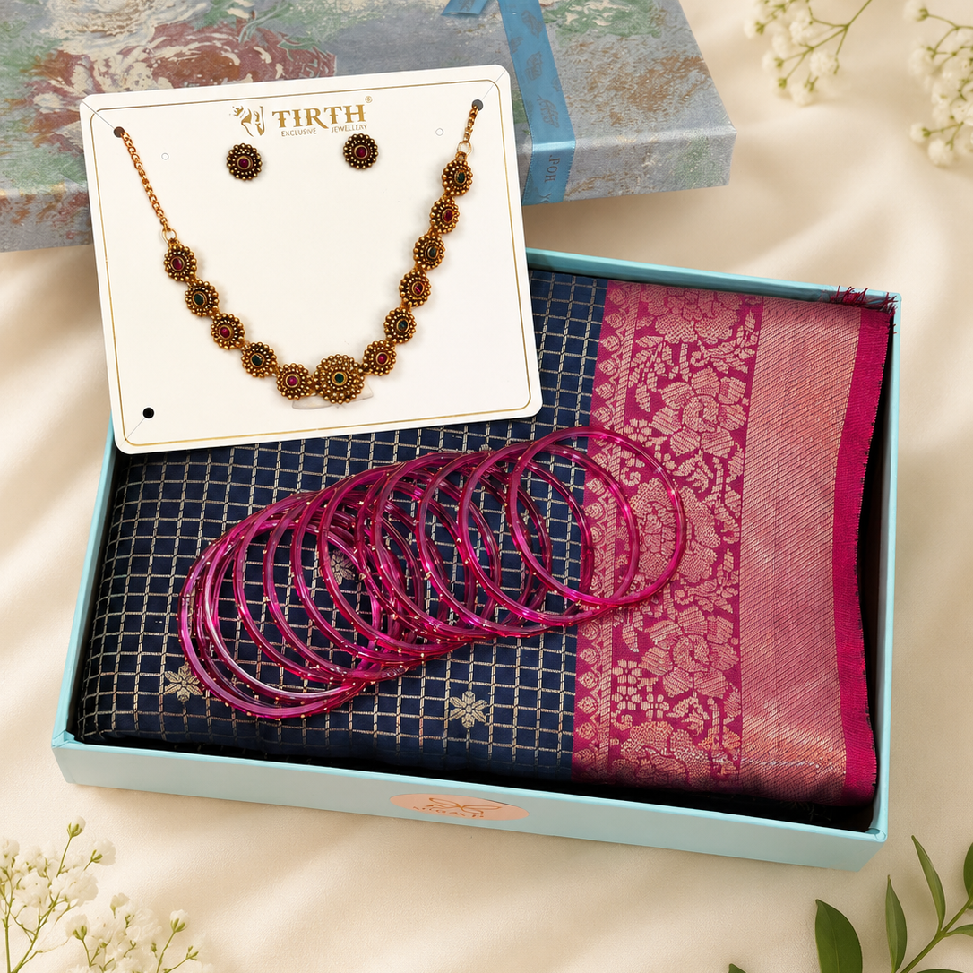 Premium Kerala Onam Gift Hamper featuring Kerala Kasavu Saree, traditional necklace set, designer jhumka earrings, pink kuppivala glass bangles, and luxury gift box by Miravie.
