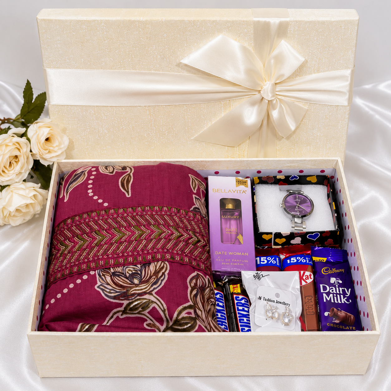 women's gift hamper with a Maslin churidhar, wristwatch, Bella Vita mini perfume, earrings, chocolates, and premium gift box.