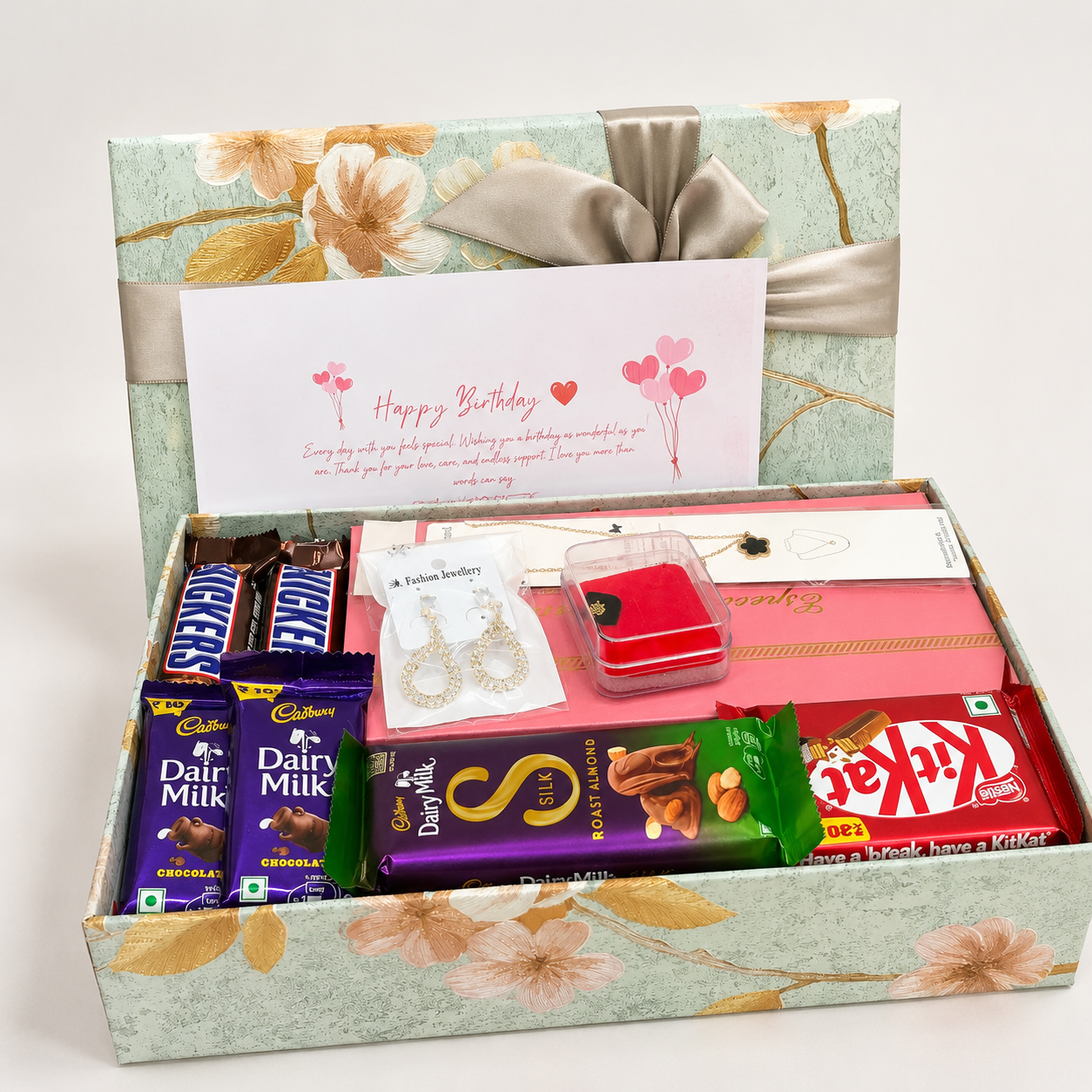 birthday gift hamper with chocolates, fashion jewellery, greeting card, and premium gift box. Perfect for women, friends, sisters, and loved ones.