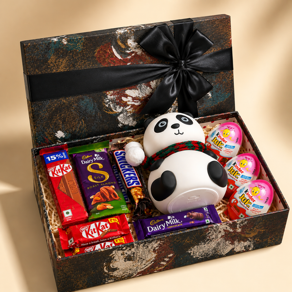 Premium gift hamper with light panda decorative lamp and assorted chocolates packed in a luxury black gift box.