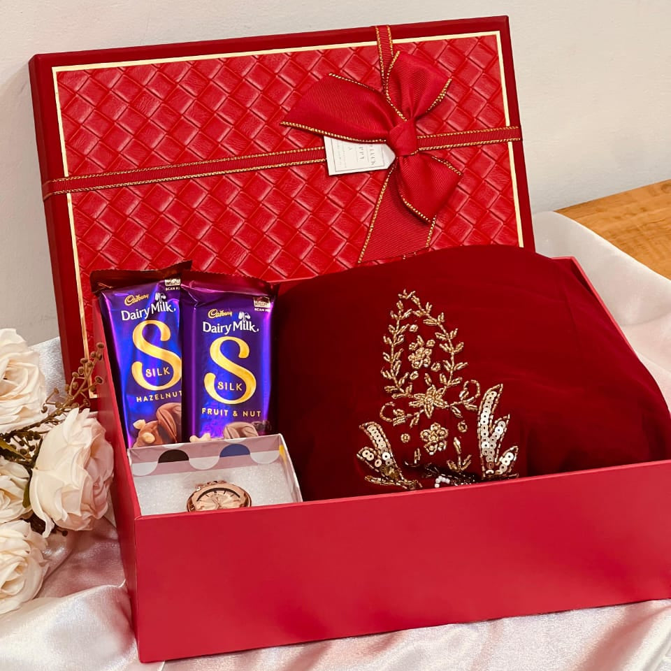 Premium ethnic dress gift box with chocolates and women’s watch in luxury red packaging