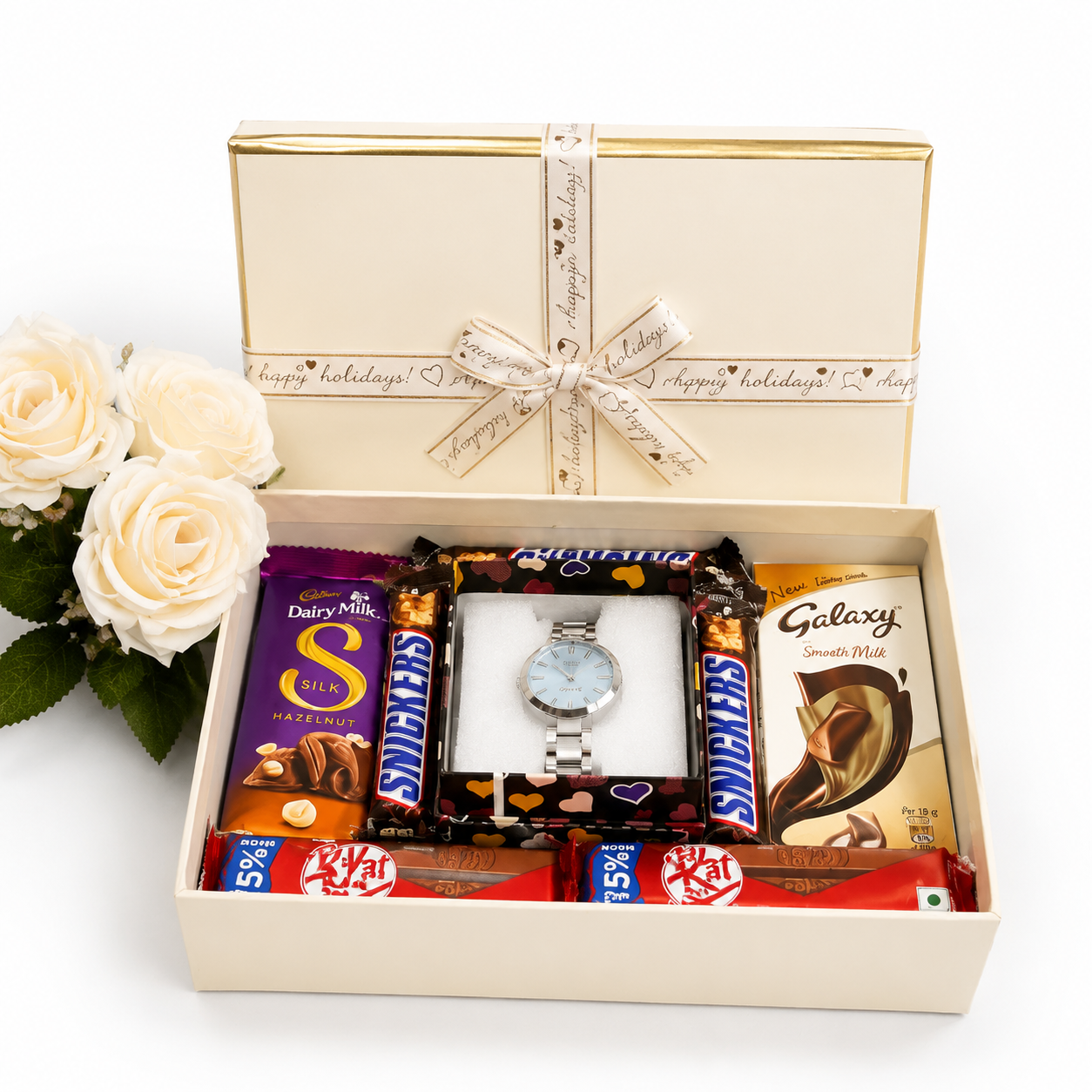 Luxury gift hamper with premium watch, Snickers, KitKat, Galaxy and Dairy Milk Silk chocolates arranged in an elegant gift box.