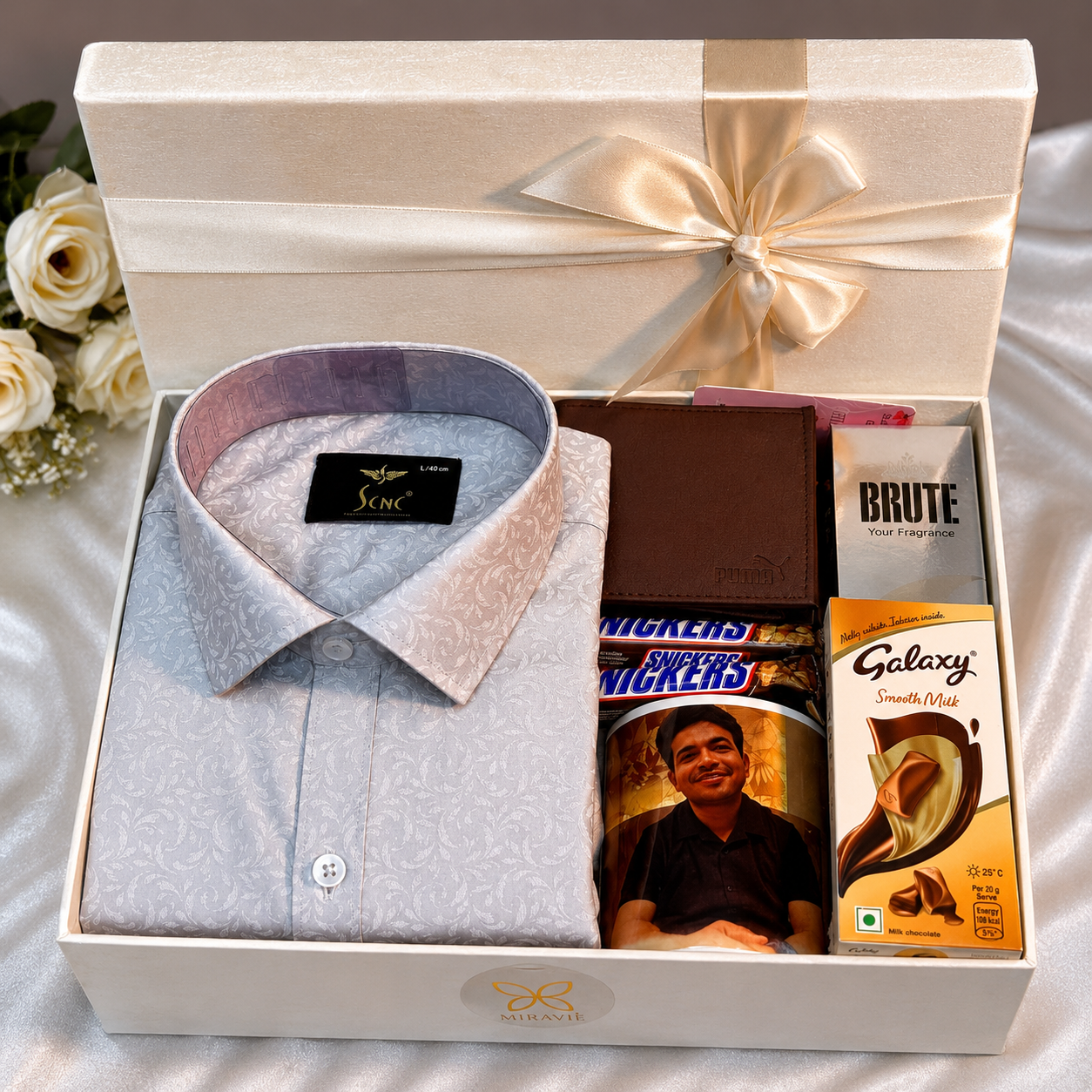 men's gift hamper featuring a premium formal shirt, personalized photo mug, leather wallet, perfume, Galaxy chocolate, three Snickers bars, and an elegant ribbon gift box for birthdays, anniversaries, and festive gifting.